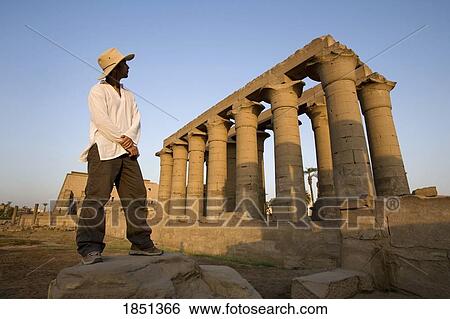 Man At Luxor Temple View Large Photo Image Stock Photograph - Man At Luxor Temple. Fotosearch