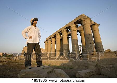 Stock Photography - Man At Luxor Temple. Fotosearch