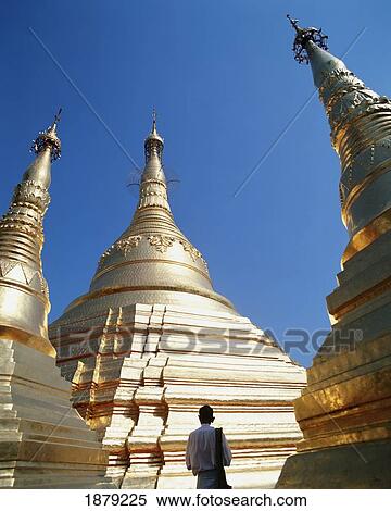 Man At The Gilded Pagoda Of Shwe Dagon, Rangoon, Myanmar View Large Photo Image Stock Photography - Man At The Gilded Pagoda Of Shwe Dagon, Rangoon, Myanmar. Fotosearch