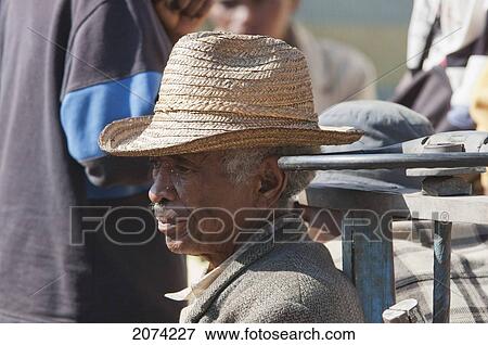 Man At The Weekly Market In Fianarantsoa, Madagascar View Large Photo Image Stock Photo - Man At The Weekly Market In Fianarantsoa, Madagascar. Fotosearch