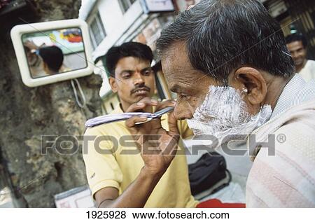 Man Being Shaved By Barber View Large Photo Image Stock Photo - Man Being Shaved By Barber. Fotosearch