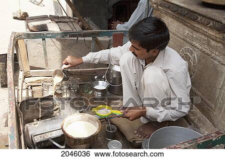 Man Cooking Chai (Tea), Nawalgarh, Rajasthan, India View Large Photo Image Stock Photograph - Man Cooking Chai (Tea), Nawalgarh, Rajasthan, India. Fotosearch
