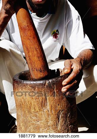 Man Crushing With Mortar And Pestle View Large Photo Image Stock Photo - Man Crushing With Mortar And Pestle. Fotosearch