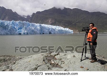 Man Filming San Rafael Glacier And Laguna San Rafael, Laguna San Rafael National Park, Aysen Region, Chile View Large Photo Image Stock Image - Man Filming San Rafael Glacier And Laguna San Rafael, Laguna San Rafael National Park, Aysen Region, Chile. Fotosearch