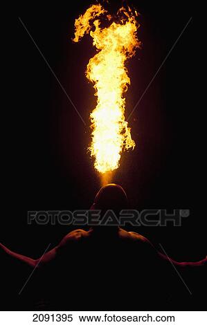 Man Fire Breathing Large Fireball At Hastings Bonfire Night, East Sussex, Uk View Large Photo Image Stock Photography - Man Fire Breathing Large Fireball At Hastings Bonfire Night, East Sussex, Uk. Fotosearch