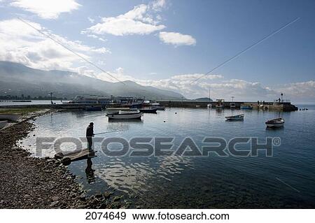 Stock Photo - Man Fishing In Ohrid Lake, Ohrid, Macedonia. Fotosearch