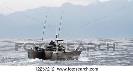 Man fishing off boat on the ocean; Queen Charlotte Islands, British Columbia, Canada View Large Photo Image Stock Image - Man fishing off boat on the ocean; Queen Charlotte Islands, British Columbia, Canada. Fotosearch