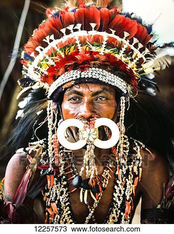 Man from Oro Province dressed in traditional attire; Miln Bay, Papua New Guinea View Large Photo Image Stock Image - Man from Oro Province dressed in traditional attire; Miln Bay, Papua New Guinea. Fotosearch
