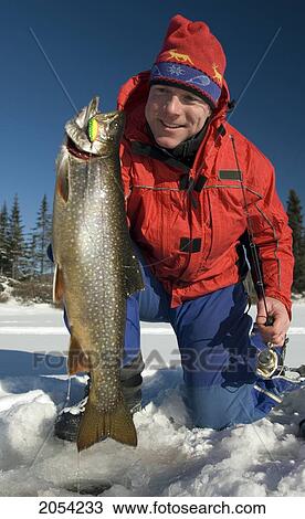 Man Holding A Splake Ice Fishing, Wawa, Ontario View Large Photo Image Stock Image - Man Holding A Splake Ice Fishing, Wawa, Ontario. Fotosearch