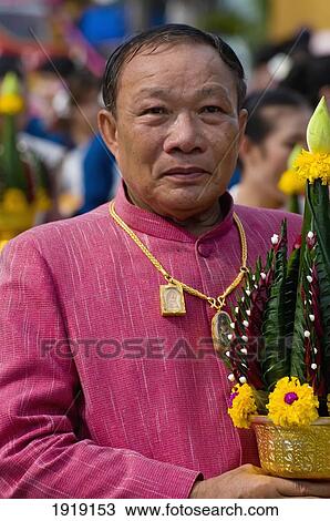 Man Holding Offering View Large Photo Image Stock Image - Man Holding Offering. Fotosearch