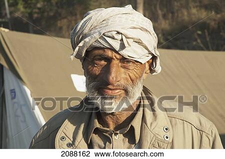 Man In A Relief Camp After The 8 October 2005 Earthquake, Bagh, Azad Kashmir, Pakistan View Large Photo Image Stock Image - Man In A Relief Camp After The 8 October 2005 Earthquake, Bagh, Azad Kashmir, Pakistan. Fotosearch