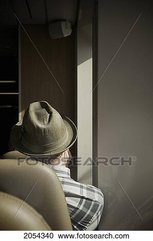 Man In Hat Sitting On A Ferry, Swartz Bay, Bc View Large Photo Image Stock Image - Man In Hat Sitting On A Ferry, Swartz Bay, Bc. Fotosearch