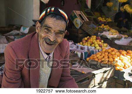Stock Photo - Man In Market In Moulay Idriss, Portrait, Morocco. Fotosearch