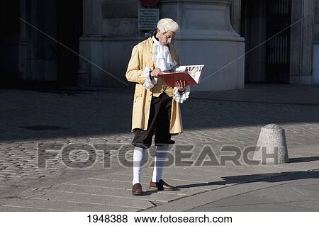 Stock Photo - Man in period costume selling theatre tickets, Vienna (Wien), Austria. Fotosearch