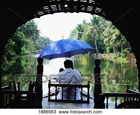 Man In Rice Boat, Backwaters View Large Photo Image Stock Image - Man In Rice Boat, Backwaters. Fotosearch