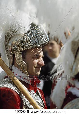 Stock Photography - Man In Roman Soldier Costume In Semana Santa Parade Through Seville, Andalucia, Spain. Fotosearch