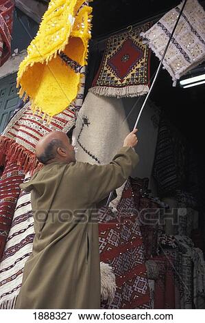 Stock Photo - Man In Shop. Fotosearch