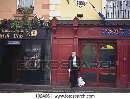 Stock Image - Man In Street. Fotosearch