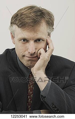 Stock Image - Man in suit; Edmonton, Alberta, Canada. Fotosearch