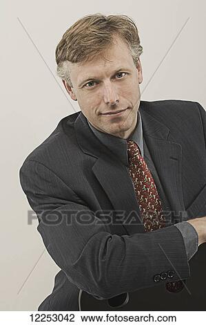 Stock Image - Man in suit; Edmonton, Alberta, Canada. Fotosearch