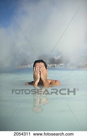 Man In The Blue Lagoon Geothermal Spa; Grindav View Large Photo Image Stock Image - Man In The Blue Lagoon Geothermal Spa; Grindav. Fotosearch