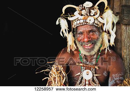 Man in traditional Bila on the Sepik River; Papua New Guinea View Large Photo Image Stock Photo - Man in traditional Bila on the Sepik River; Papua New Guinea. Fotosearch