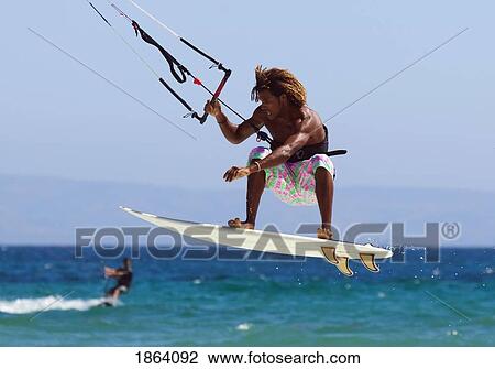 Man Kite Surfing; Costa De La Luz, Andalusia, Spain View Large Photo Image Stock Image - Man Kite Surfing; Costa De La Luz, Andalusia, Spain. Fotosearch