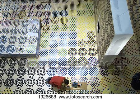 Stock Photo - Man Laying Floor In Art Exhibition In The Pompidou Centre For Modern Art, Paris, France. Fotosearch