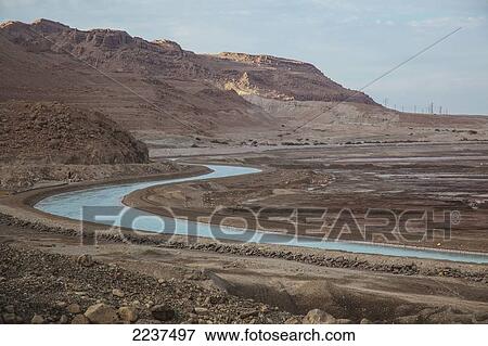 Stock Photo - Man-Made River Winding Across The Landscape; Israel. Fotosearch