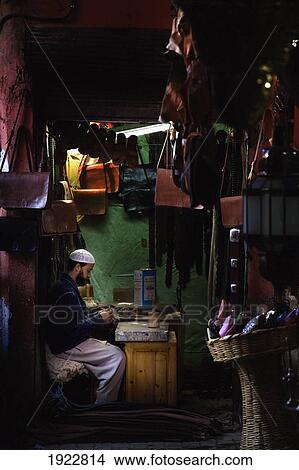 Picture - Man Making Handbags From Leather In Souk, Marrakesh, Morocco. Fotosearch