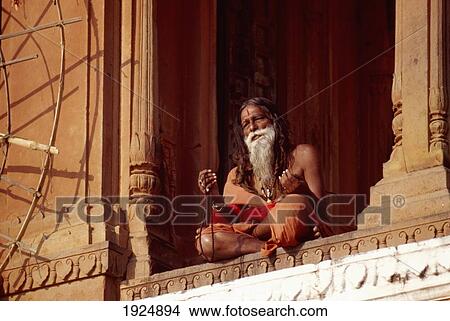 Man Meditates On Ledge View Large Photo Image Picture - Man Meditates On Ledge. Fotosearch