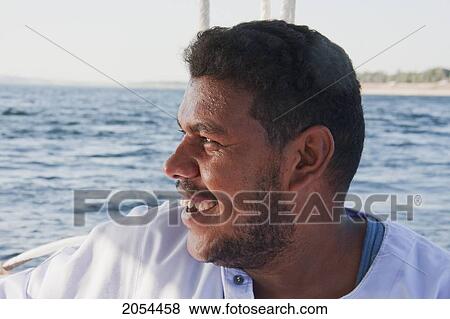 Stock Photo - Man On A Felucca, Aswan, Egypt. Fotosearch