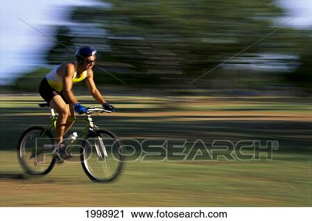Stock Image - Man On Mountain Bike In Action, Blur B1232. Fotosearch
