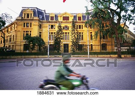 Man On Scooter Driving On Trang Tien Street In Hanoi, Blurred Motion View Large Photo Image Stock Image - Man On Scooter Driving On Trang Tien Street In Hanoi, Blurred Motion. Fotosearch