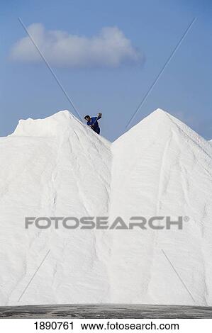 Man On Top Of Salt Heaps View Large Photo Image Stock Image - Man On Top Of Salt Heaps. Fotosearch