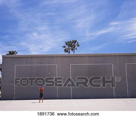 Man Playing Hand Ball At Venice Beach, Rear View View Large Photo Image Stock Photograph - Man Playing Hand Ball At Venice Beach, Rear View. Fotosearch