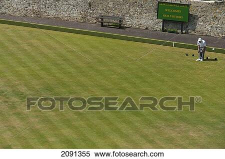 Stock Photography - Man Playing Lawn Bowling In Lewes, East Sussex, Uk. Fotosearch