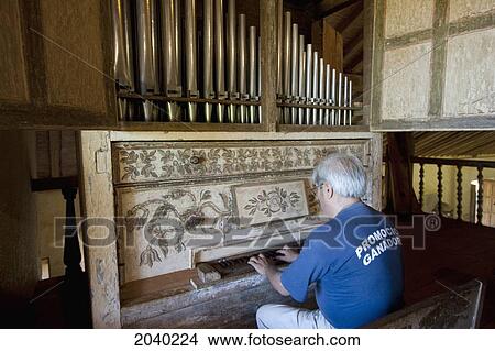 Man Playing The 18Th Century Church Organ At The Jesuit Mission Of Santa Ana De Velasco, Santa Cruz Department, Bolivia View Large Photo Image Picture - Man Playing The 18Th Century Church Organ At The Jesuit Mission Of Santa Ana De Velasco, Santa Cruz Department, Bolivia. Fotosearch