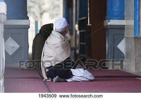 Stock Photo - Man Praying At The Mausoleum Of Amir Habibullah In Jalalabad, Nangarhar Province, Afghanistan. Fotosearch