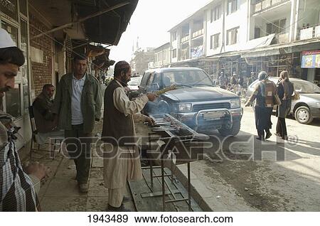 Stock Photo - Man Preparing Kebabs At A Kabul Restaurant,, Afghanistan. Fotosearch