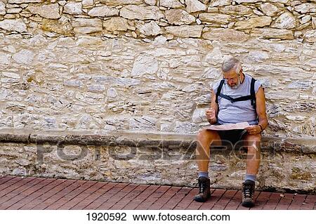 Man Reading Map In Begur View Large Photo Image Stock Image - Man Reading Map In Begur. Fotosearch