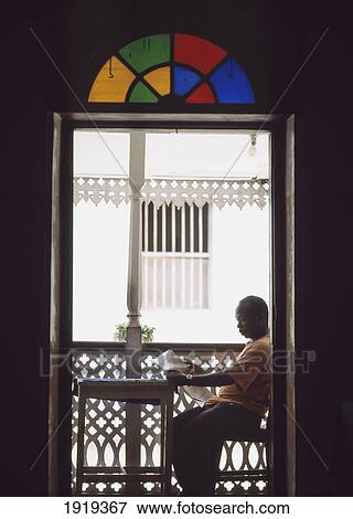 Stock Photo - Man Reading Newspaper. Fotosearch
