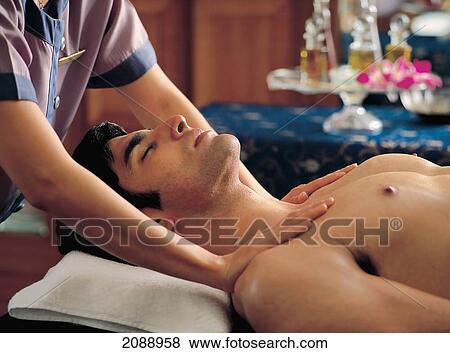 Stock Photo - Man Receiving A Thai Massage At Oberoi Vanyavilas Spa; Ranthambore India. Fotosearch
