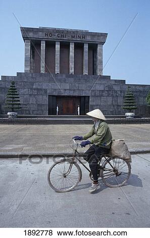 Man Riding Bicycle In Front Of Ho Chi Minh Mausoleum, Side View View Large Photo Image Stock Photo - Man Riding Bicycle In Front Of Ho Chi Minh Mausoleum, Side View. Fotosearch