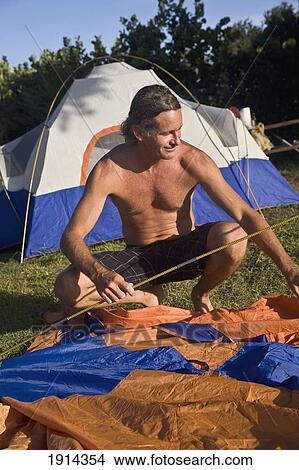 Man Setting Up Tent At Jetty Park View Large Photo Image Picture - Man Setting Up Tent At Jetty Park. Fotosearch