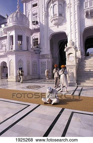 Man Sitting On Rug, Golden Temple, Armritsar View Large Photo Image Stock Photo - Man Sitting On Rug, Golden Temple, Armritsar. Fotosearch