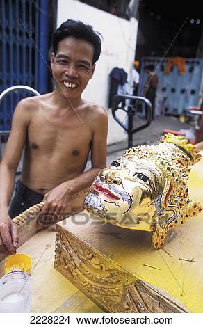 Picture - Man sleeping in Bangkok, Thailand. Fotosearch