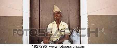 Man Smoking Cigar Outside Home View Large Photo Image Stock Photography - Man Smoking Cigar Outside Home. Fotosearch