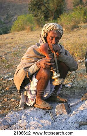 Man Smoking Hookah Alwar District Rajasthan India View Large Photo Image Stock Image - Man Smoking Hookah Alwar District Rajasthan India. Fotosearch