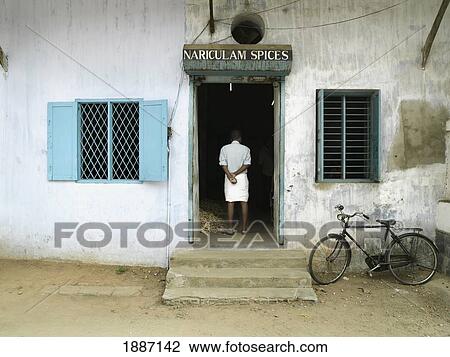 Man Standing In Doorway Of Shop View Large Photo Image Stock Image - Man Standing In Doorway Of Shop. Fotosearch